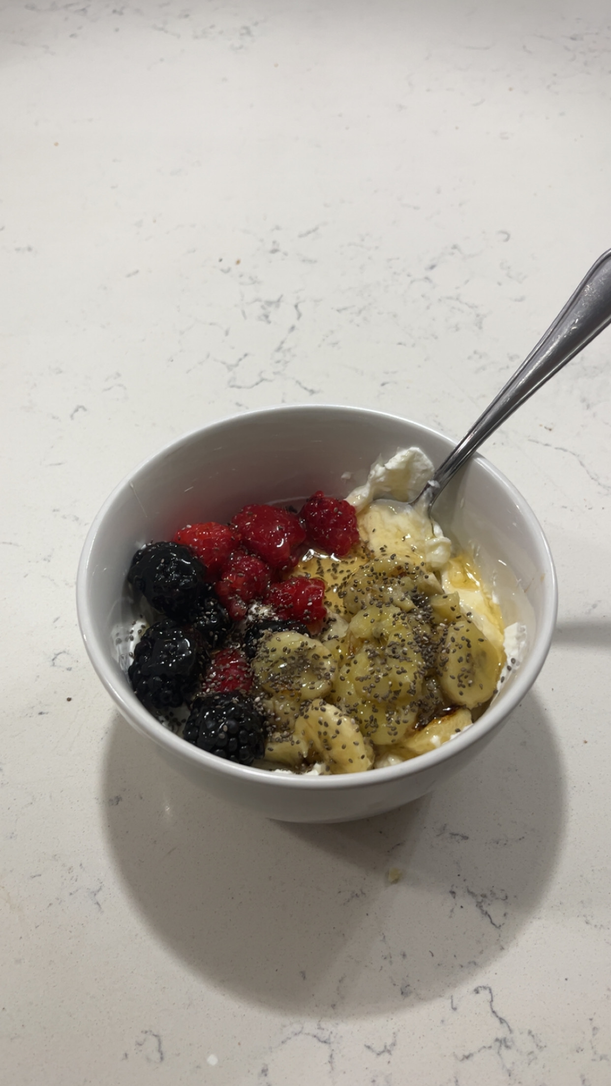 Yogurt bowl with berries and banana